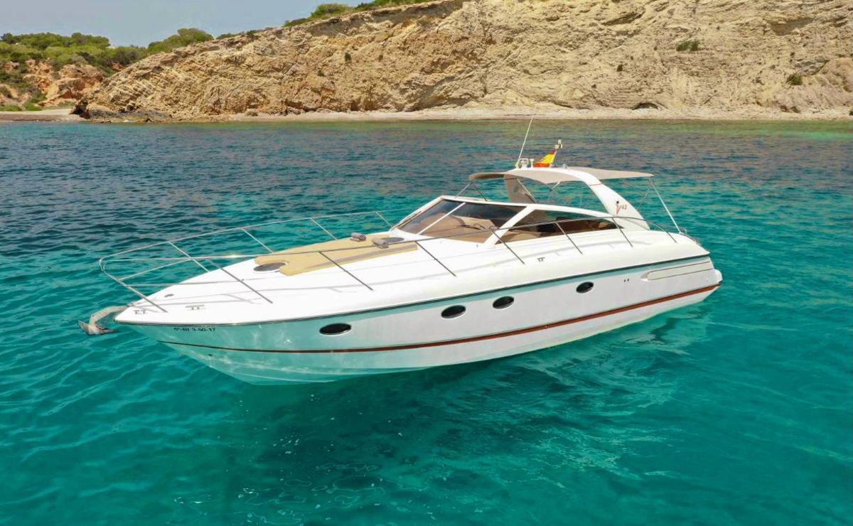 Princess V42 at anchor in turquoise water